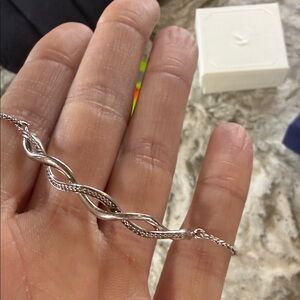 Elegant Silver Twist Bracelet